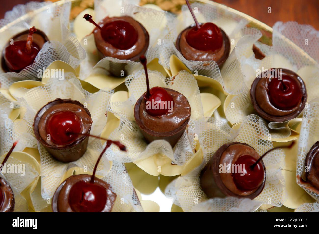 chocolate and sweet cherry in a delicious cup - party candy Stock Photo