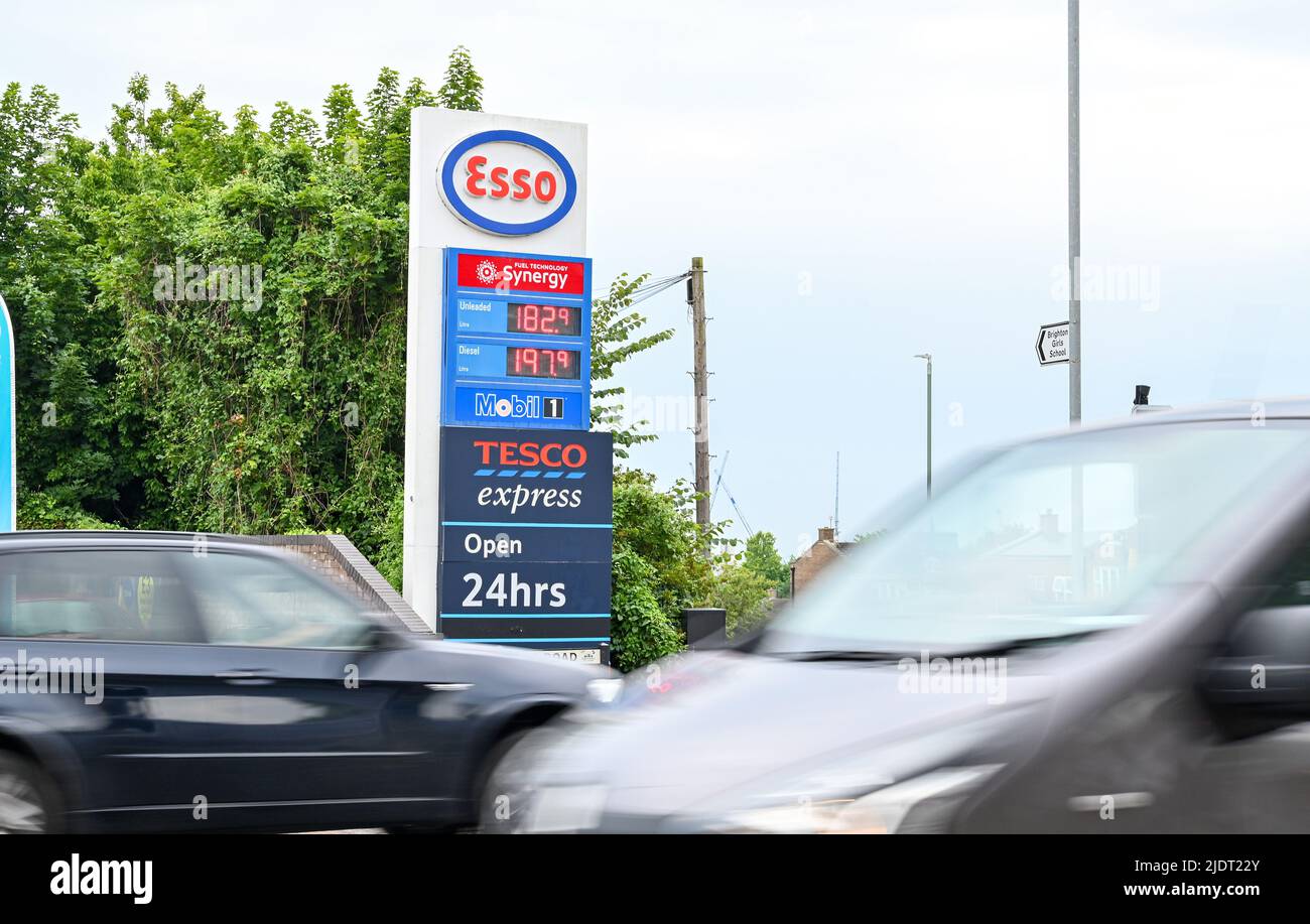 Brighton UK 23rd June 2022 - High fuel prices at an Esso garage in Hove , Brighton as the cost of living crisis continues in the UK : Credit Simon Dack / Alamy Live News Stock Photo