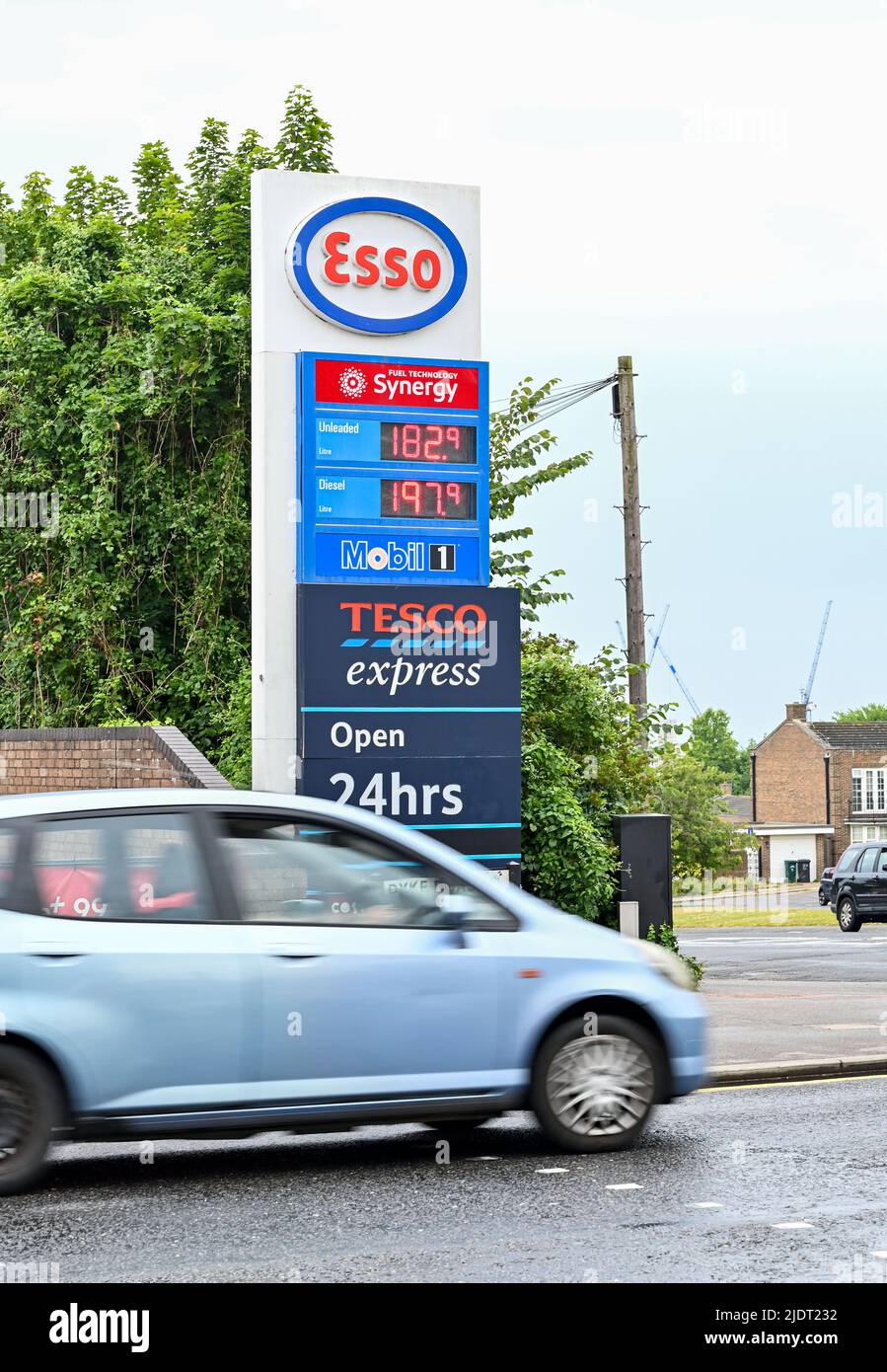 Brighton UK 23rd June 2022 - High fuel prices at an Esso garage in Hove , Brighton as the cost of living crisis continues in the UK : Credit Simon Dack / Alamy Live News Stock Photo