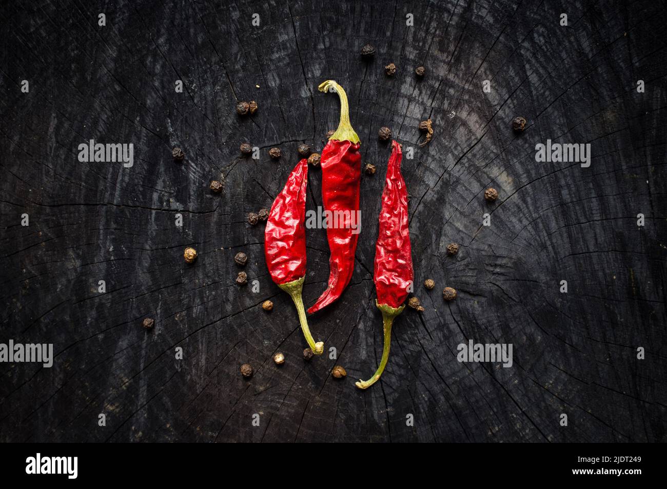 hot red pepper and black pepper Stock Photo Alamy