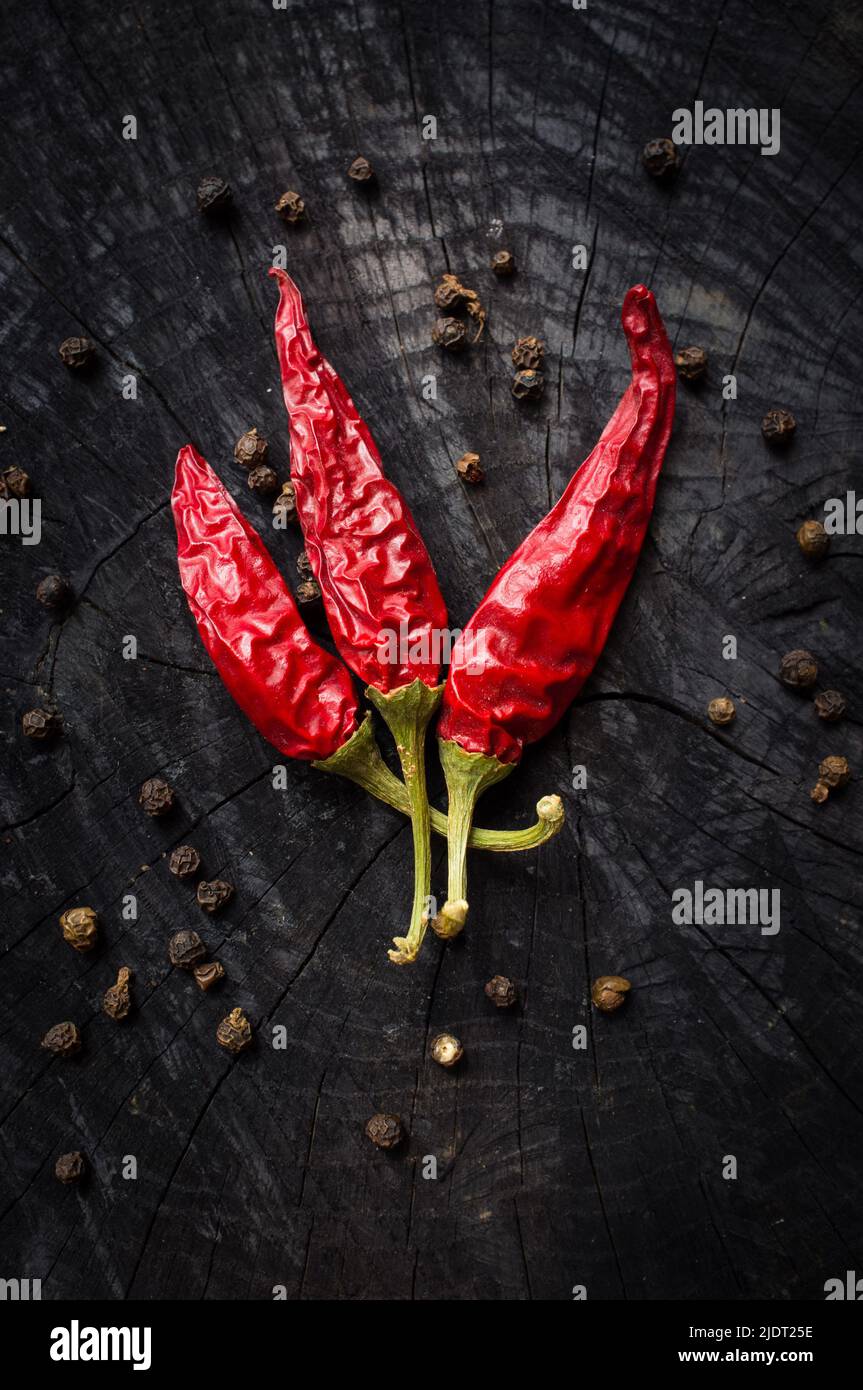 hot red pepper and black pepper Stock Photo Alamy