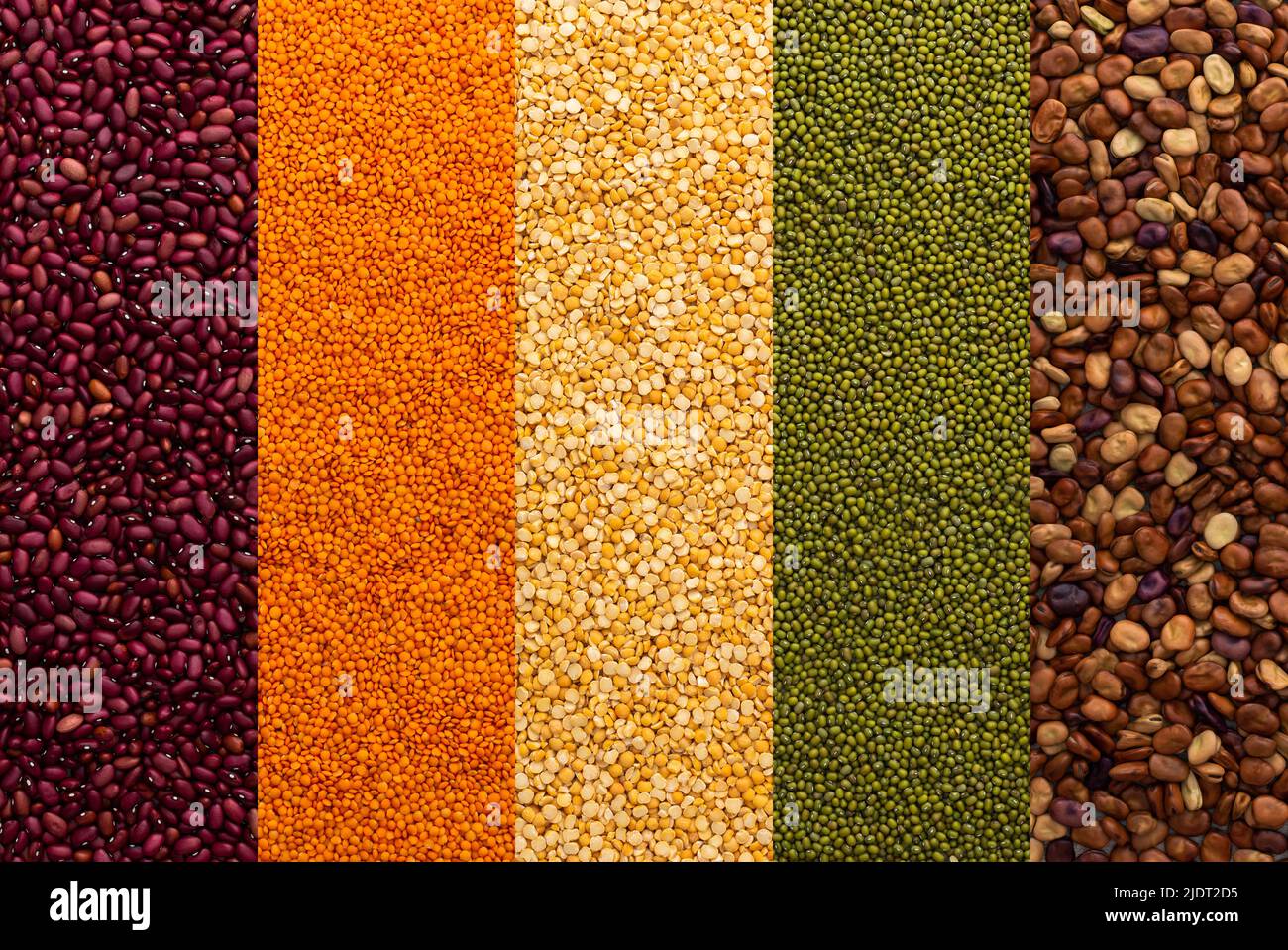 Different types of legumes, yellow peas and lentils and mung beans, red and brown beans, top view Stock Photo