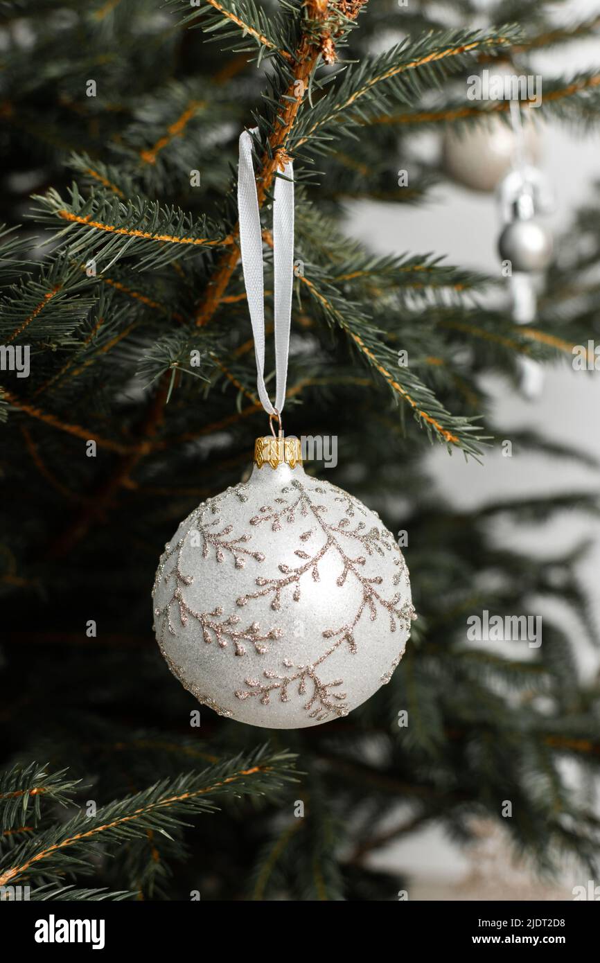 Beautiful Christmas ball close-up on a Christmas tree branch Stock Photo