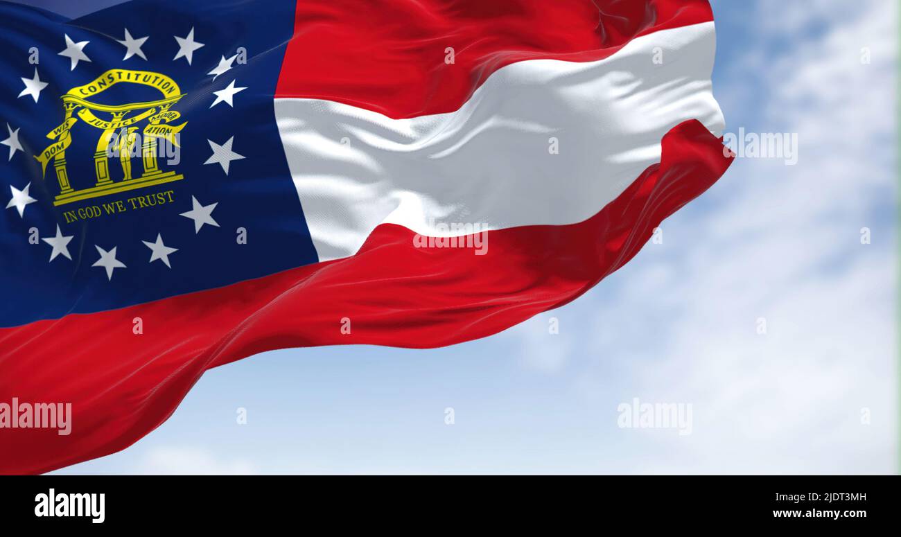 The state flag of Georgia waving in the wind. Georgia is a state in the Southeastern region of the United States. Democracy and independence. Stock Photo