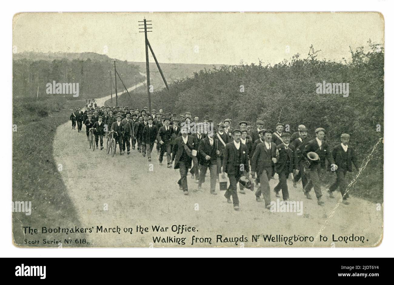 Original Edwardian era postcard of marching working class men. The caption states 'Northamptonshire Bootmakers march on the war office walking from Raunds near Wellingborough to London', Wellingborough is in the county of Northamptonshire, England, U.K Published by Scott Russell & Co., The  protestors were led by Commander Joe Gribble and the march commenced on 8th May 1905. U.K. Stock Photo