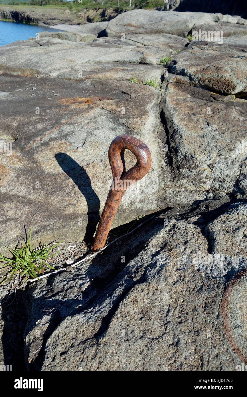 iron eye bolt in solid rock at Point Prim Digby Nova Scotia canada Stock Photo