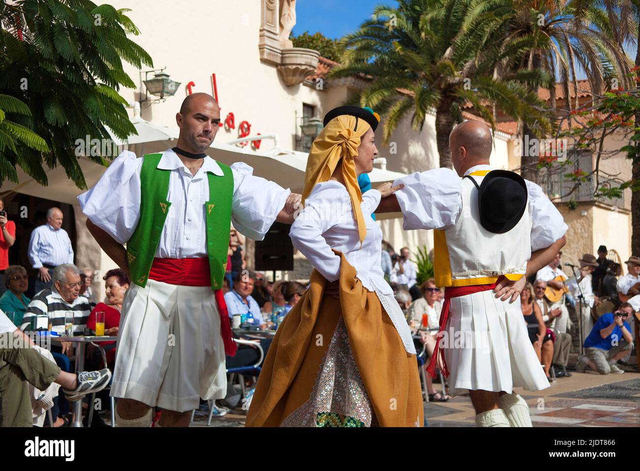 Folklore show at Pueblo Canario, musicians and dancer with traditional costumes at Parque Doramas, Las Palmas, Grand Canary, Canary islands, Spain Stock Photo