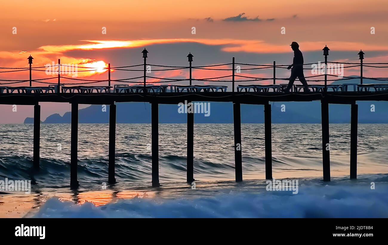 Man walking over bridge hi-res stock photography and images - Alamy