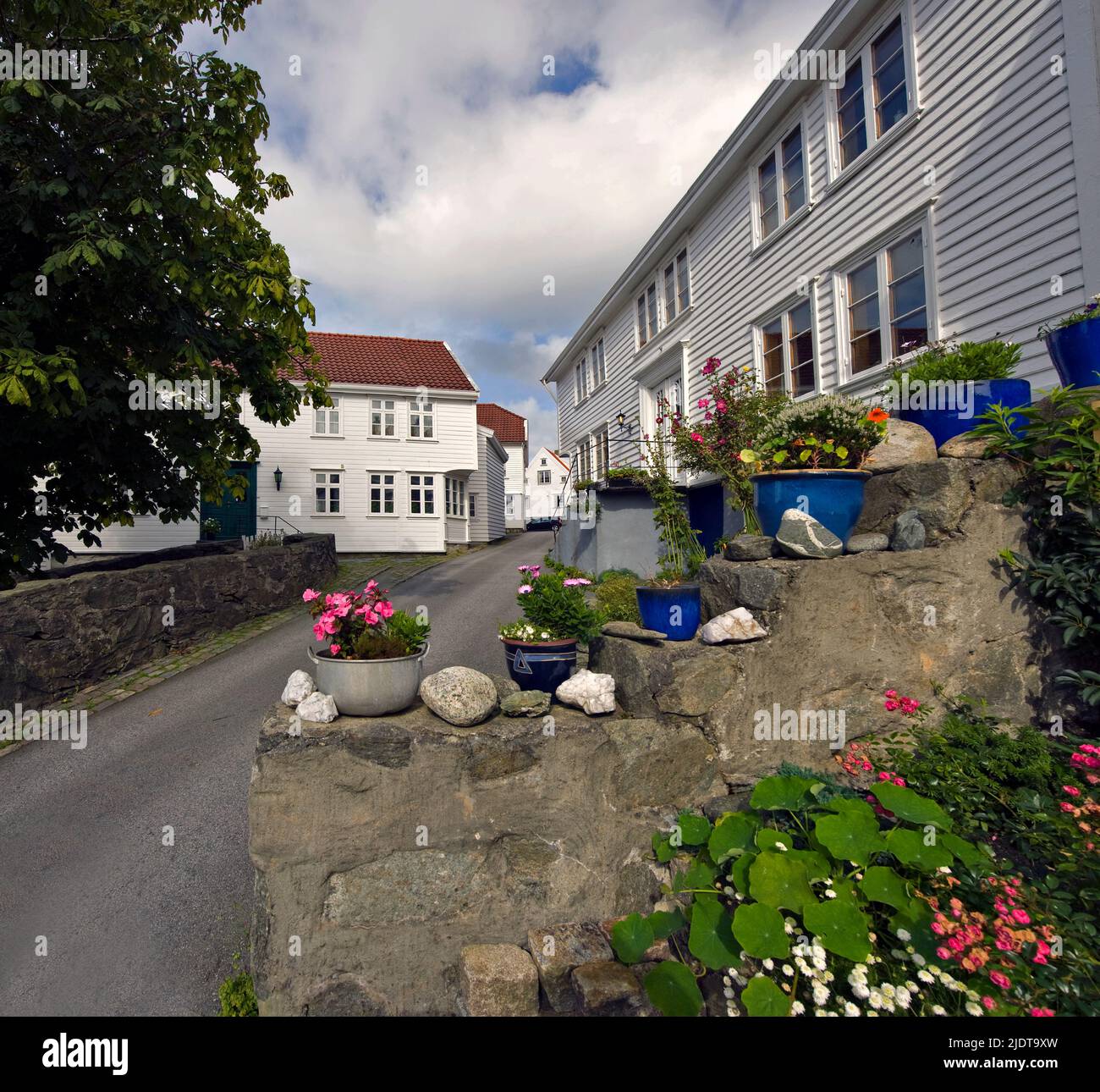 Old, traditional houses in the beautiful city of Skudenes on Karmöy, western Norway. Stock Photo