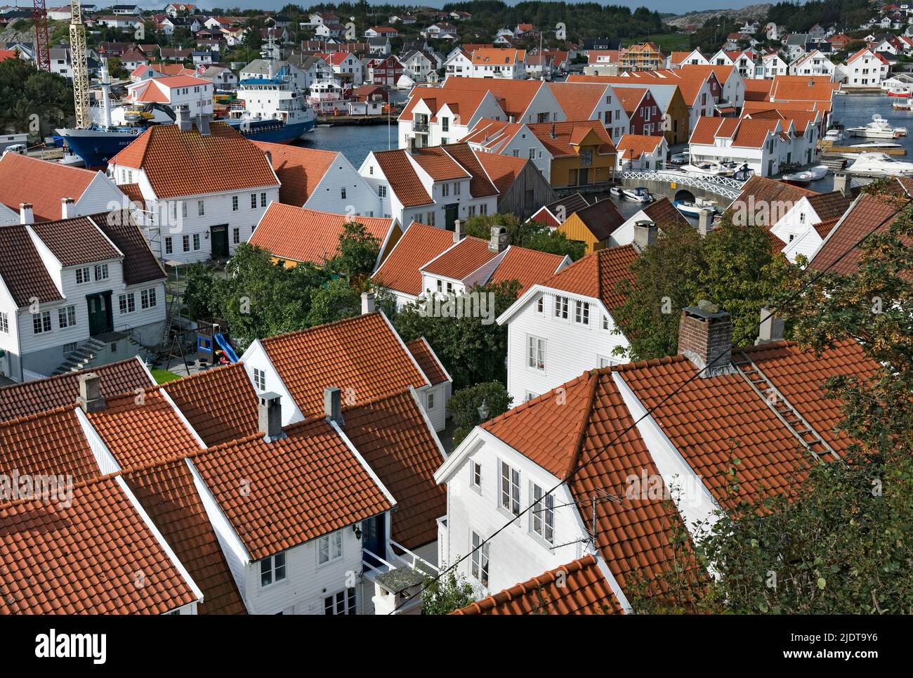 Old and traditional houses in the beautiful city of Skudenes on Karmöy, western Norway. Stock Photo