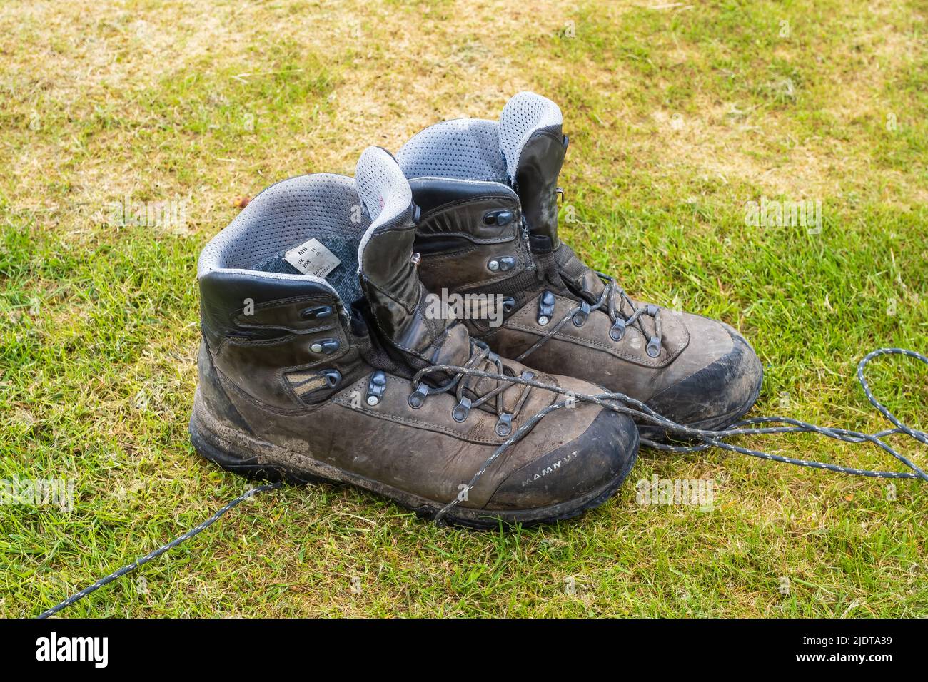 19.05.2022 Tyndrum, Argyll, Scotland, UK. A pair of boots after a day's hiking on the West Highland Way in the Scottish Highlands Stock Photo
