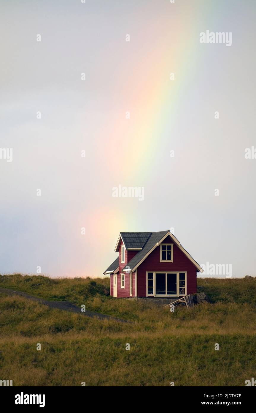 Old house with rainbow at Nyksund, Nordland, north-Norway. Stock Photo