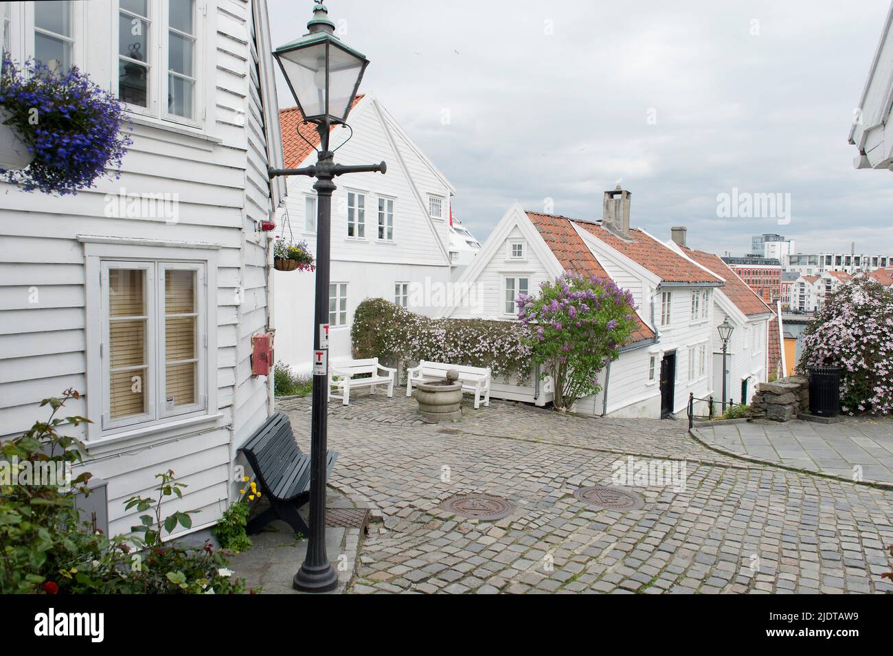 Houses and narrow streets in the old part of Stavanger, Norway, locally known as 'Gamle Stavanger'. The 173 buildings date back to 1700- and 1800-cent Stock Photo