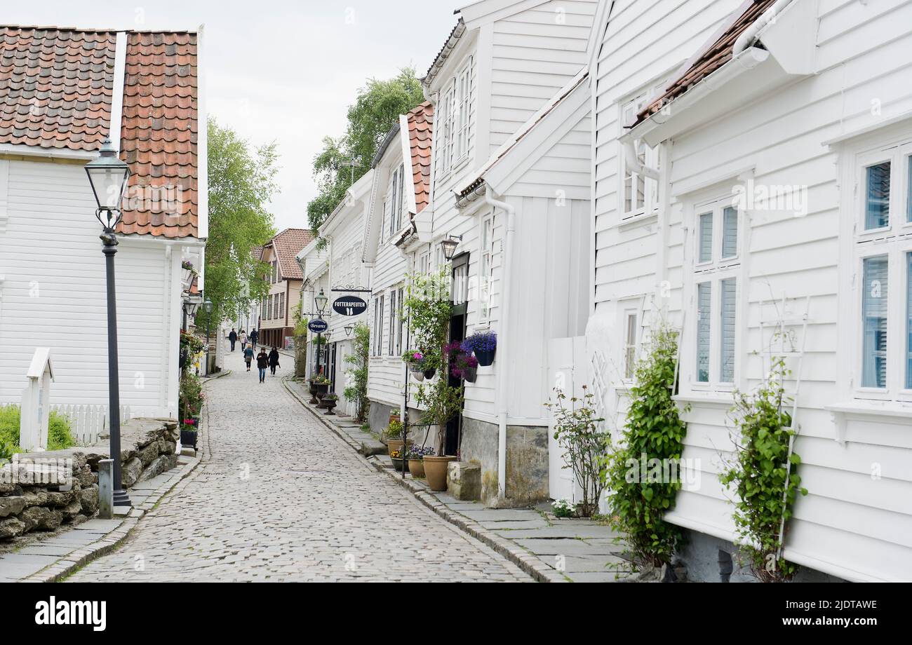 Houses and narrow streets in the old part of Stavanger, Norway, locally known as 'Gamle Stavanger'. The 173 buildings date back to 1700- and 1800-cent Stock Photo