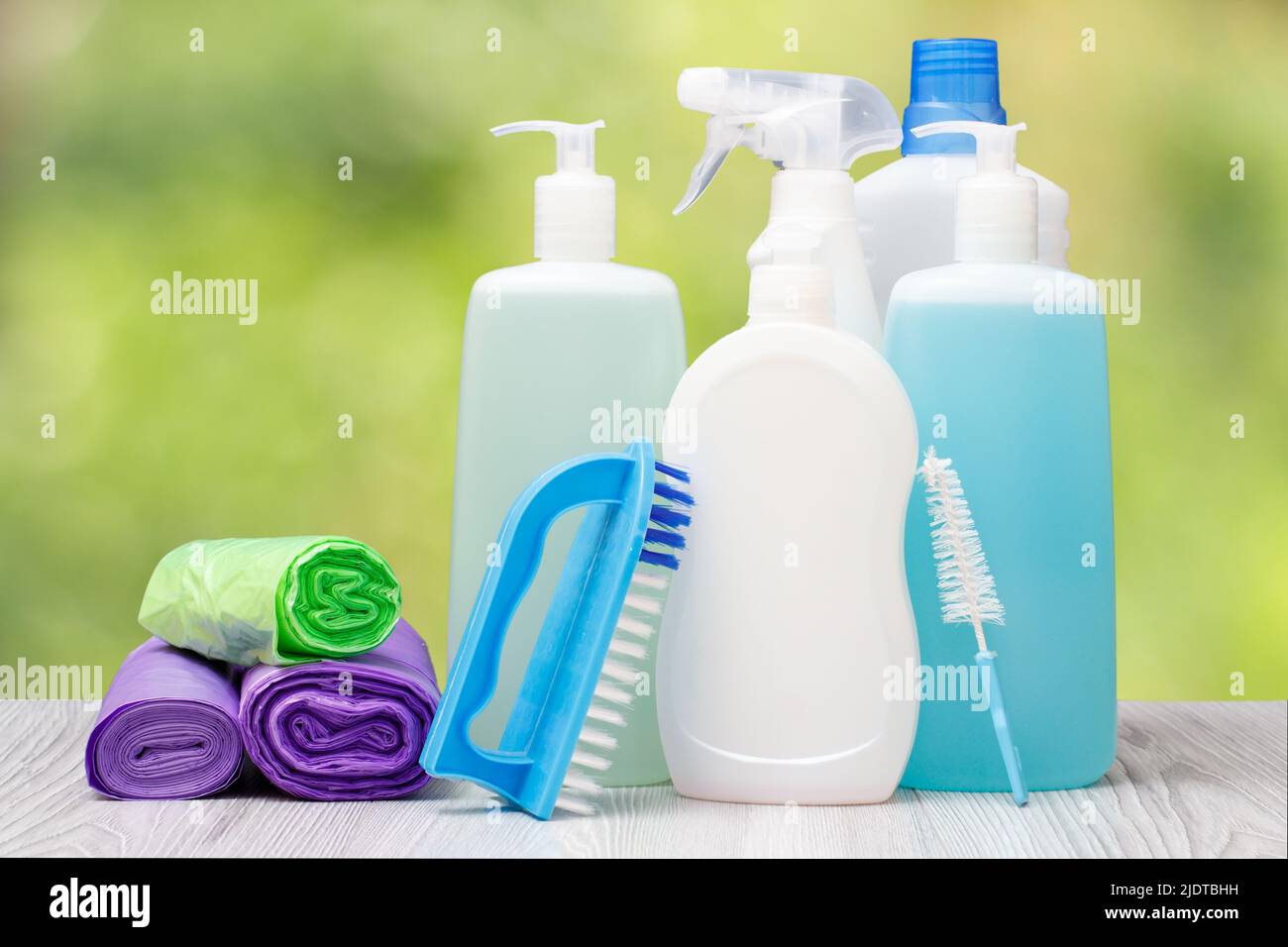 Bottles of dishwashing liquid, brushes and garbage bags Stock Photo Alamy