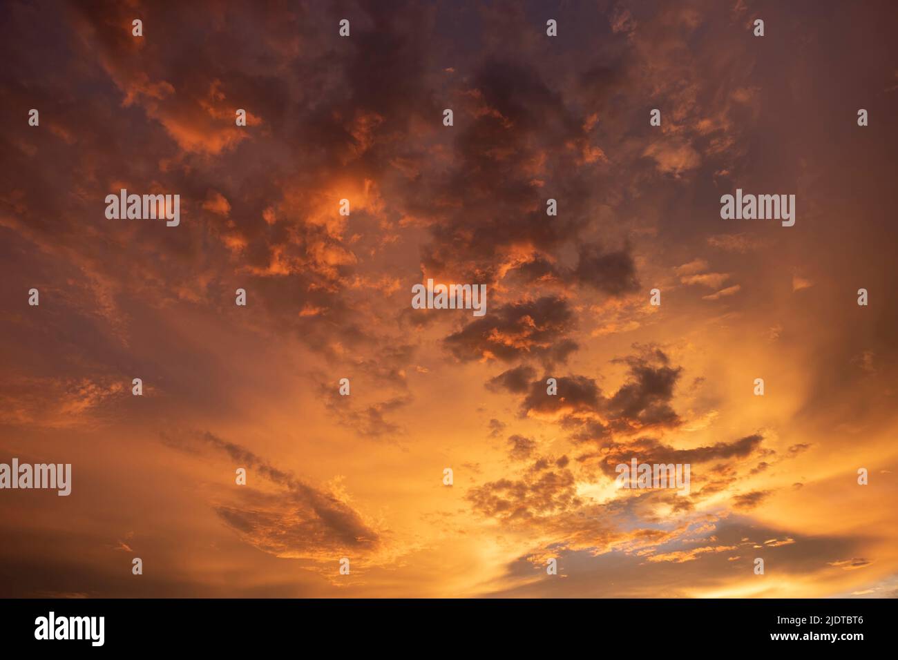 Clouds in sunset sky hi-res stock photography and images - Alamy