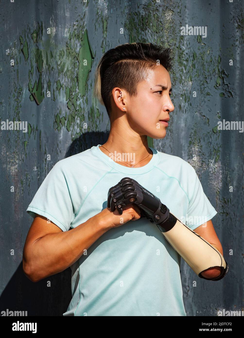 Portrait of athlete woman with prosthetic arm Stock Photo