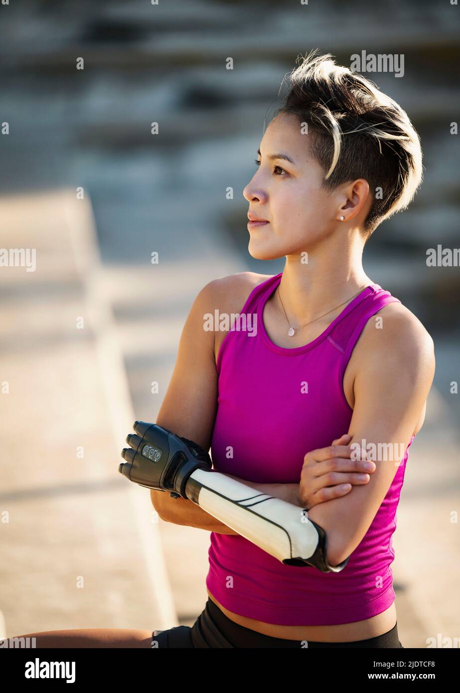 Portrait of athlete woman with prosthetic arm Stock Photo