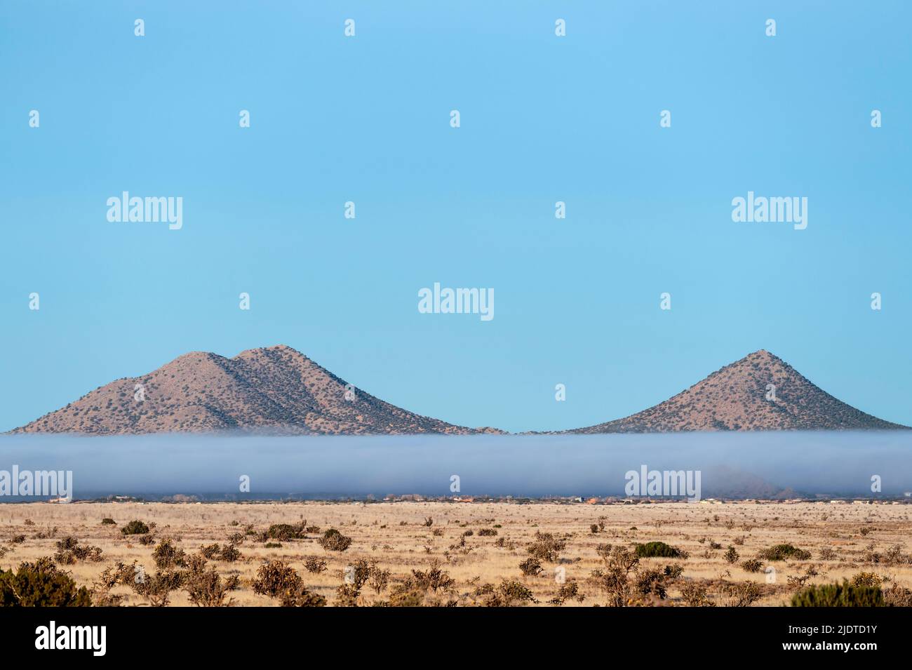 FOG BANK BELOW THE CERRILLOS HILLS, FROM SANRA FE, NM, USA Stock Photo