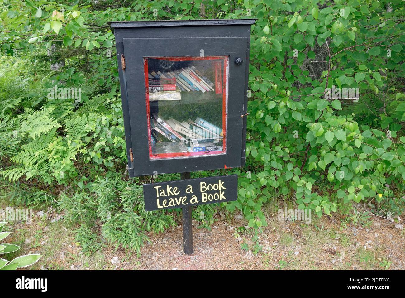 Take a book leave a book roadside library Nova Scotia Canada at Kempt Stock Photo