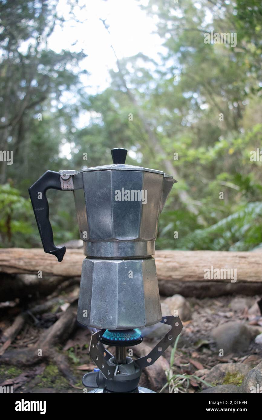 Making Coffee in the Forest on a gas stove Stock Photo Alamy