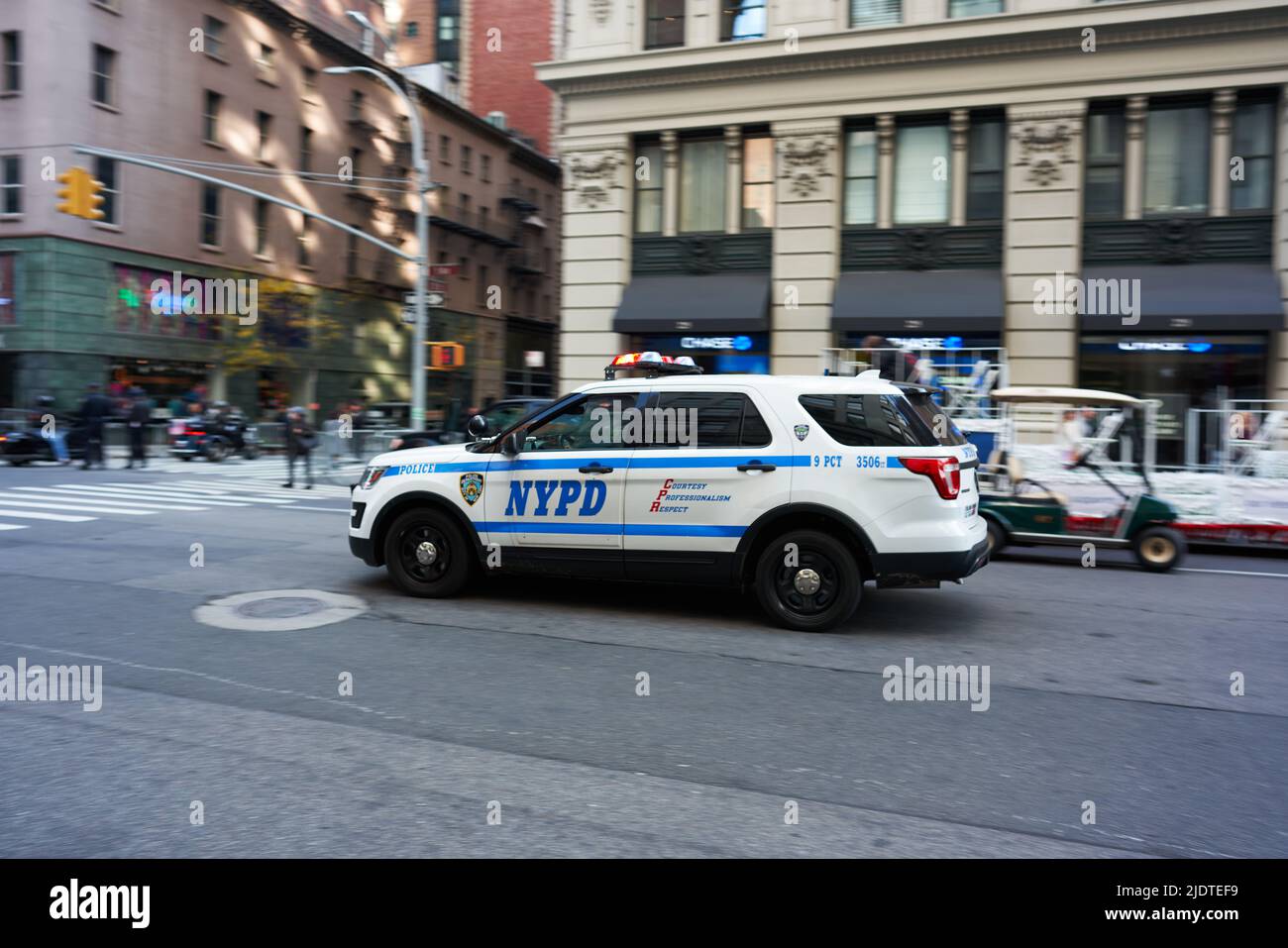 Manhattan, USA - 11. November 2021: NYPD Vehicle. New York Police SUV on fifth Avenue in Manhattan. Serve and Protect Stock Photo