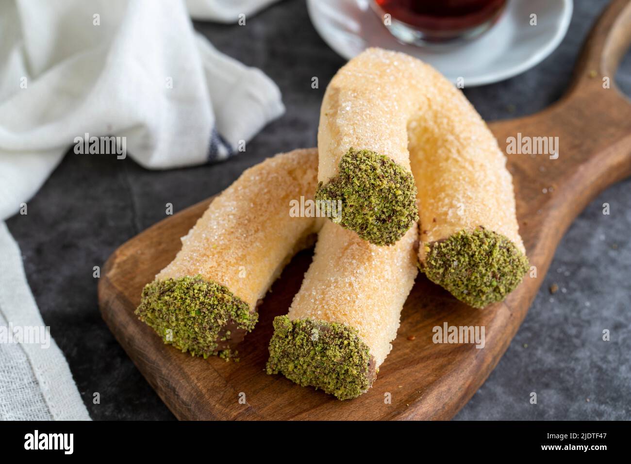 Pistachio cookies. Sweet cookies with pistachio topped. Turkish cuisine delicacies. local name pruzyen kurabiye. Close up Stock Photo