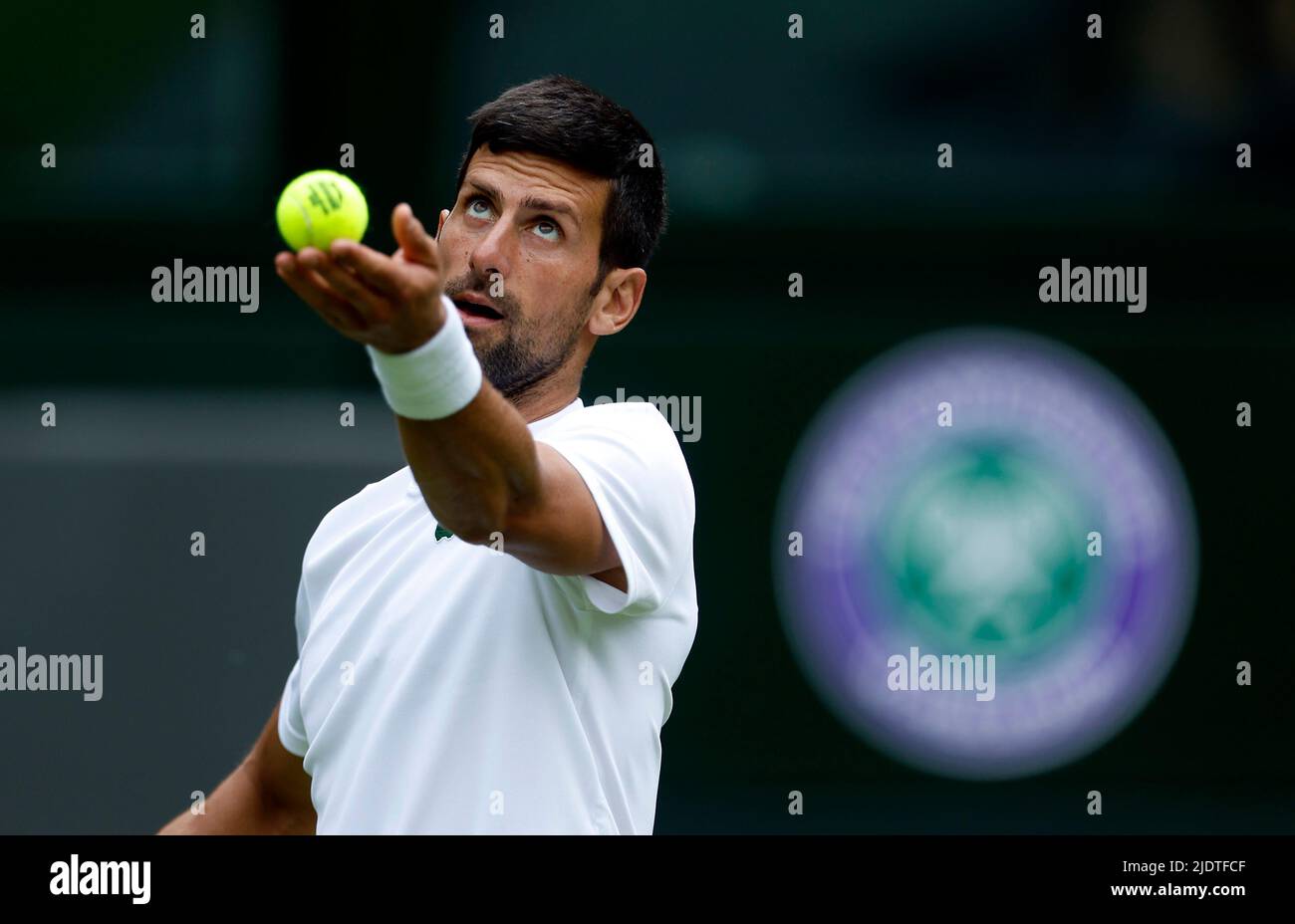 Novak Djokovic practices on centre court ahead of the 2022 Wimbledon Championship at the All England Lawn Tennis and Croquet Club, Wimbledon. Picture date: Thursday June 23, 2022. Stock Photo