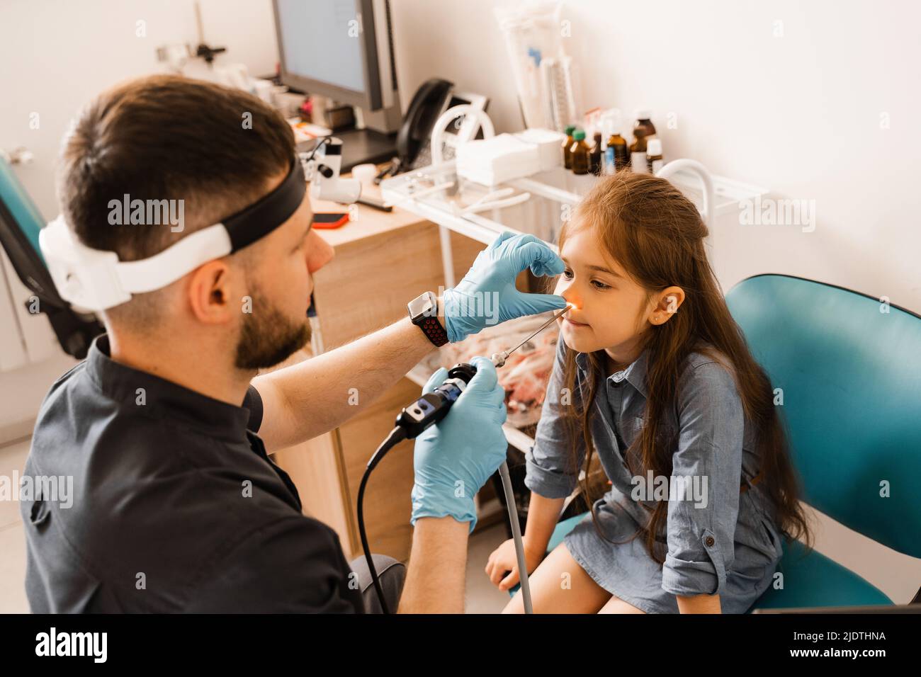 Nose endoscopy of child. Rhinoscopy procedure with rhinoscope. ENT