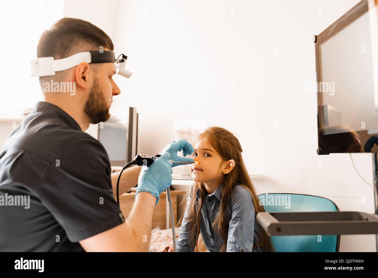 Nose endoscopy of child. Rhinoscopy procedure with rhinoscope. ENT