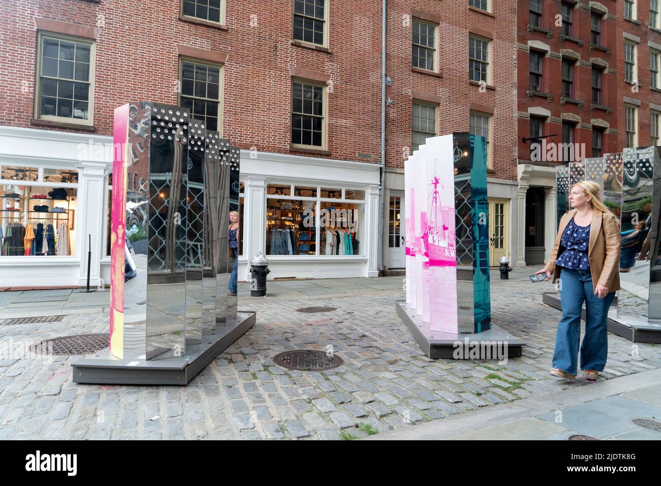 As part of the 2022 River to River Festival in Lower Manhattan, Rose DeSiano's 'Lenticular Histories' were installed in the South Street Seaport. Stock Photo