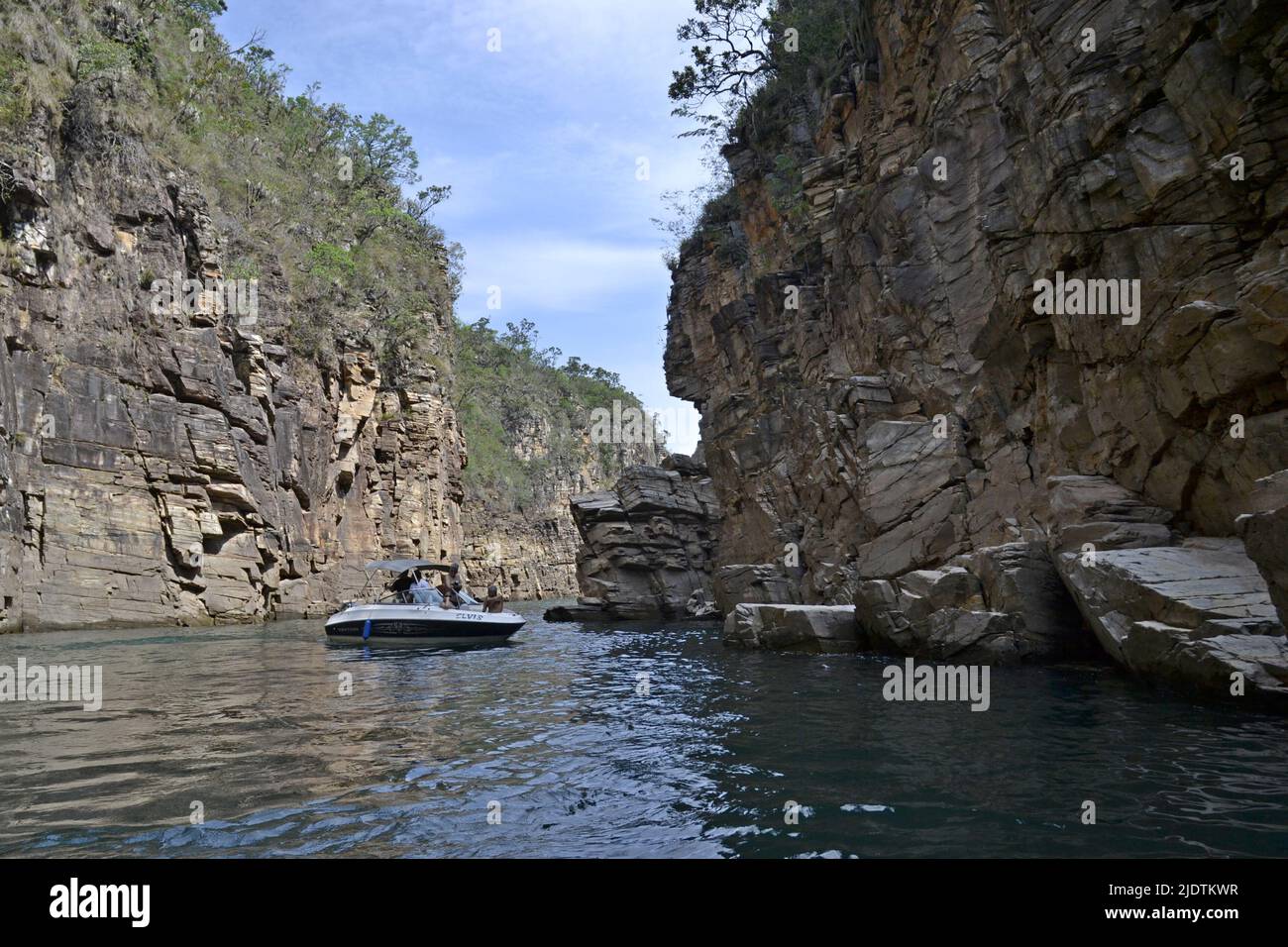 Tourists having fun on a speedboat ride inside the canyons, with several boats anchored, Brazil, South America, panoramic photo, between canyons Stock Photo