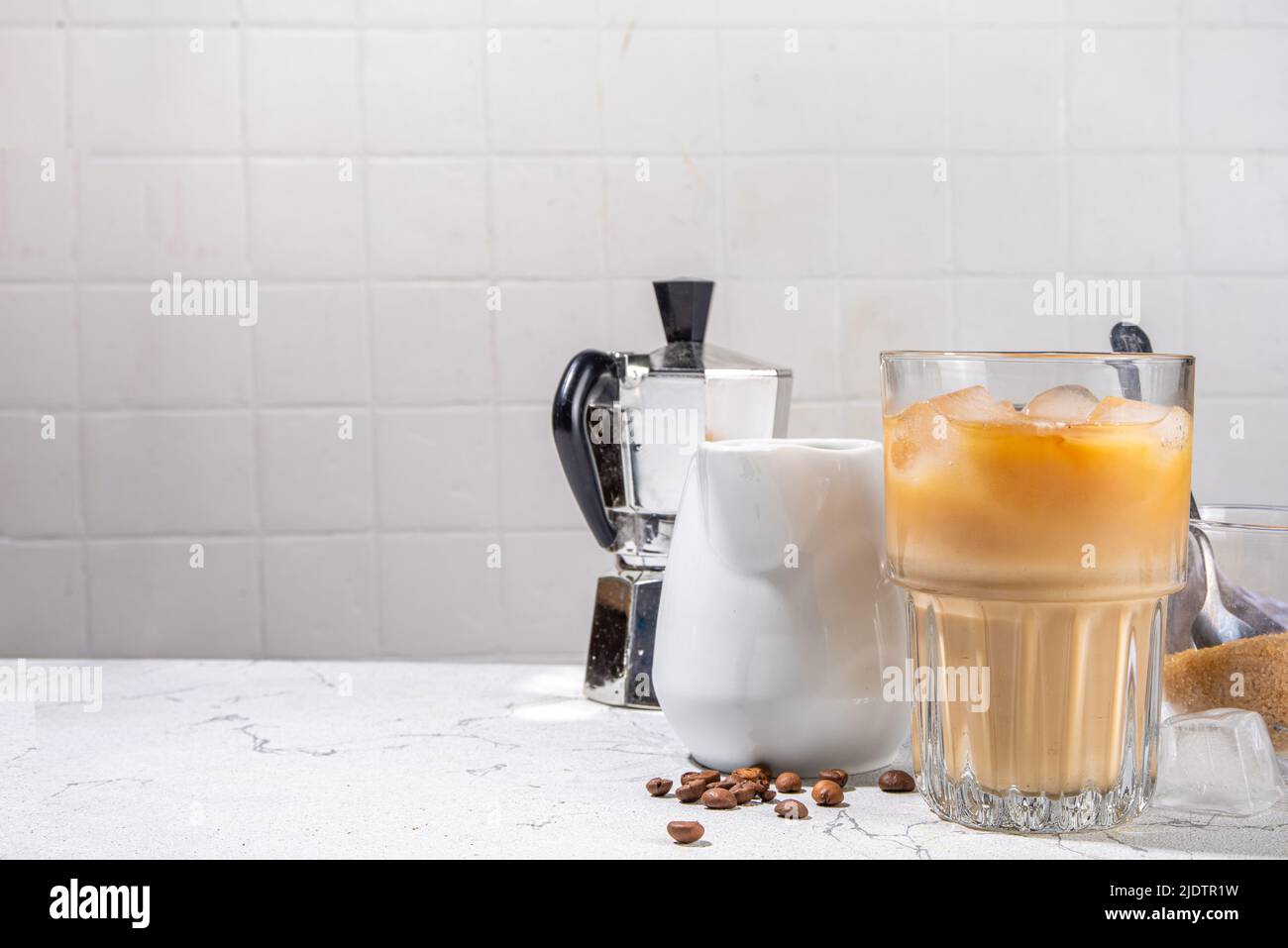 Homemade iced latte coffee, with milk poured Into Iced coffee espresso