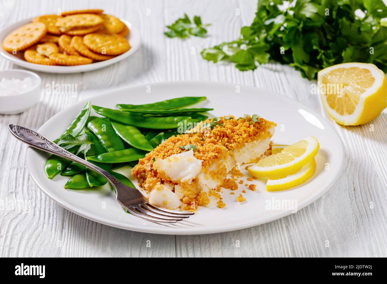 Baked Haddock with Crackers butter toppings served with boiled snow