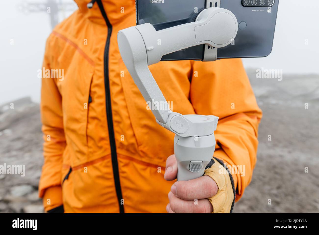 Carpathians Ukraine September 25 20221 A Man Holds A Stabilizer With carpathians-ukraine-september-25-20221-a-man-holds-a-stabilizer-with
