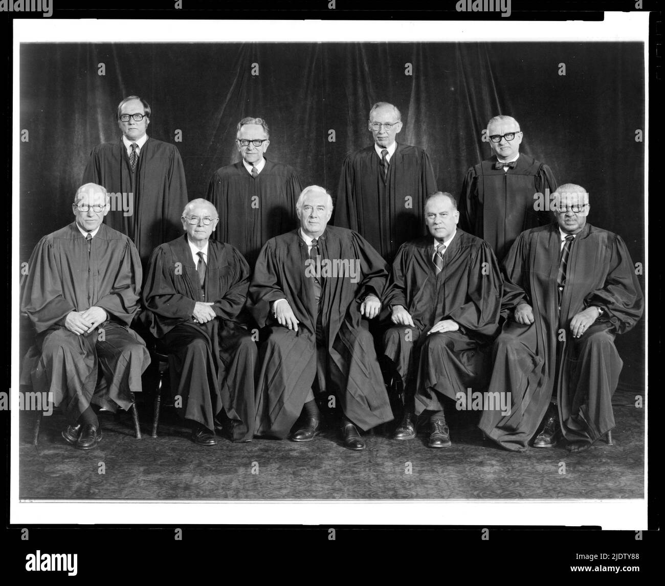 U.S. Supreme Court group portrait, 1976. Group portrait of Justices William J. Brennan, Jr.; Byron R. White; Harry A. Blackmun; William H. Rehnquist; Potter Stewart; Thurgood Marshall; Lewis F. Powell, Jr.; John Paul Stevens, III; and Chief Justice Warren E. Burger. Washington, DC, 1976. Stock Photo