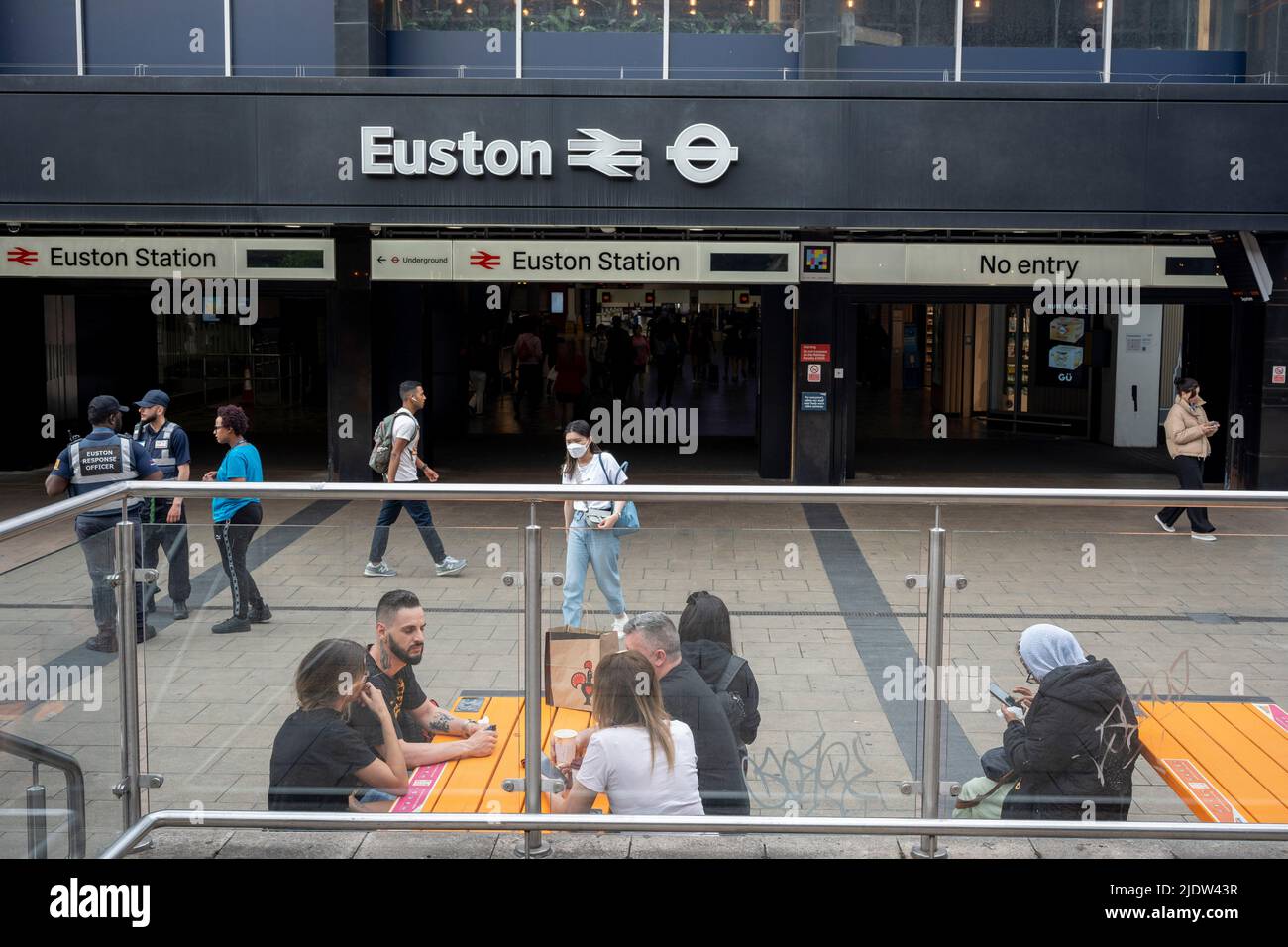 Passengers hoping to make a rail journey through Euston await a service on the second day of the UK's rail strike, when railway and London Underground workers with the RMT union have taken industrial action, the most disruptive rail strike across England, Scotland and Wales for thirty years, on 23rd June 2022, in London, England. Stock Photo