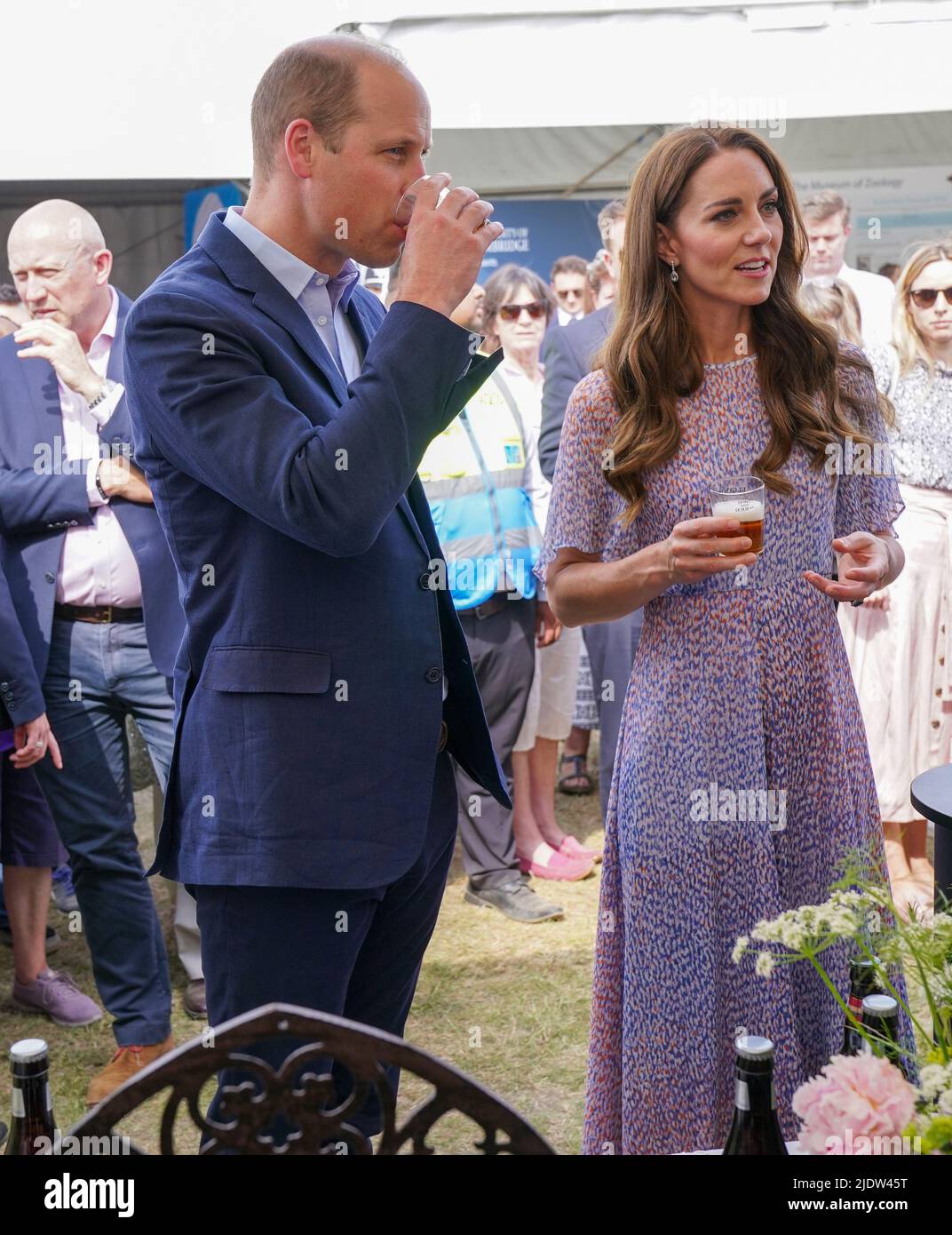 The Duke and Duchess of Cambridge have a drink during a visit to the first  ever Cambridgeshire County Day at the July Racecourse, Newmarket,  Cambridgeshire. Picture date: Thursday June 23, 2022 Stock