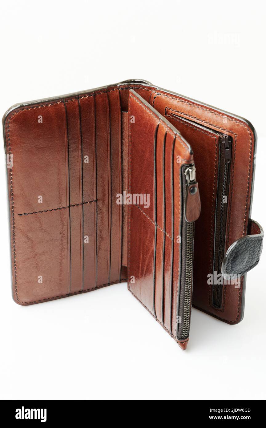 New brown leather wallet with zipper and pockets isolated Stock Photo
