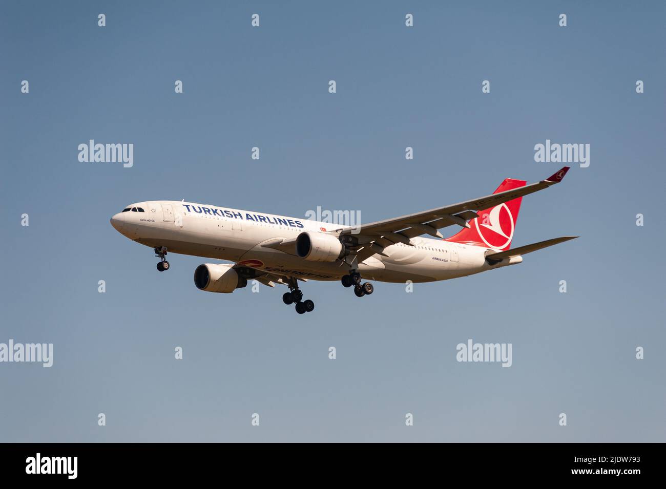 18.06.2022, Berlin, Germany, Europe - A Turkish Airlines Airbus A330-200 passenger aircraft approaches Berlin Brandenburg Airport BER for landing. Stock Photo