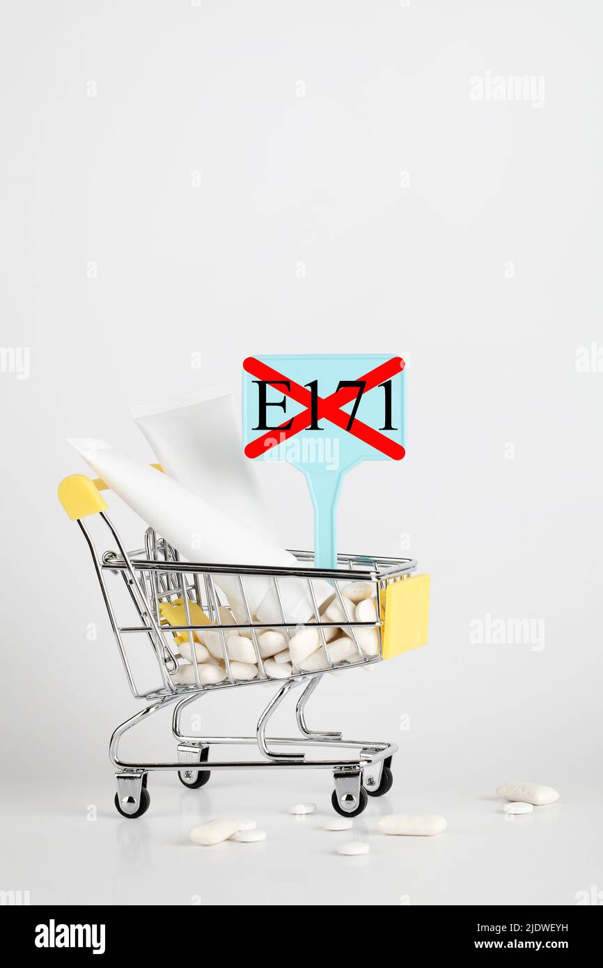 Titanium dioxide, E171, dangerous additive concept. gum, pills