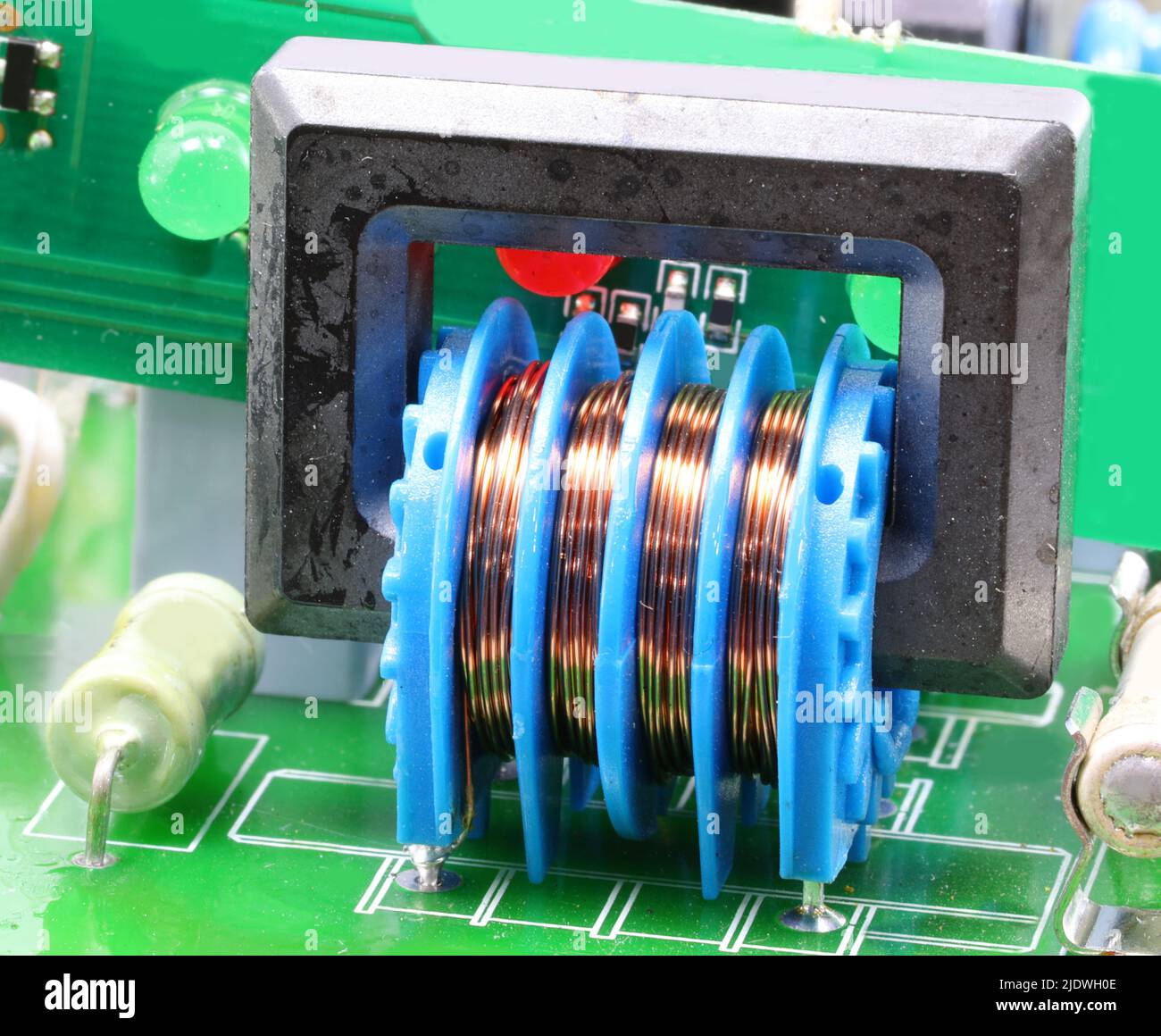 miniaturized transformer with wound copper wires for managing the