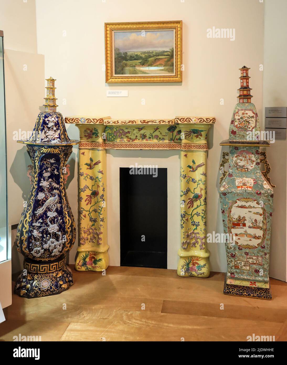 A pottery fire surround and large vases on display in the Potteries Museum and Art Gallery, Hanley, Stoke-on-Trent, Staffs, England, UK Stock Photo