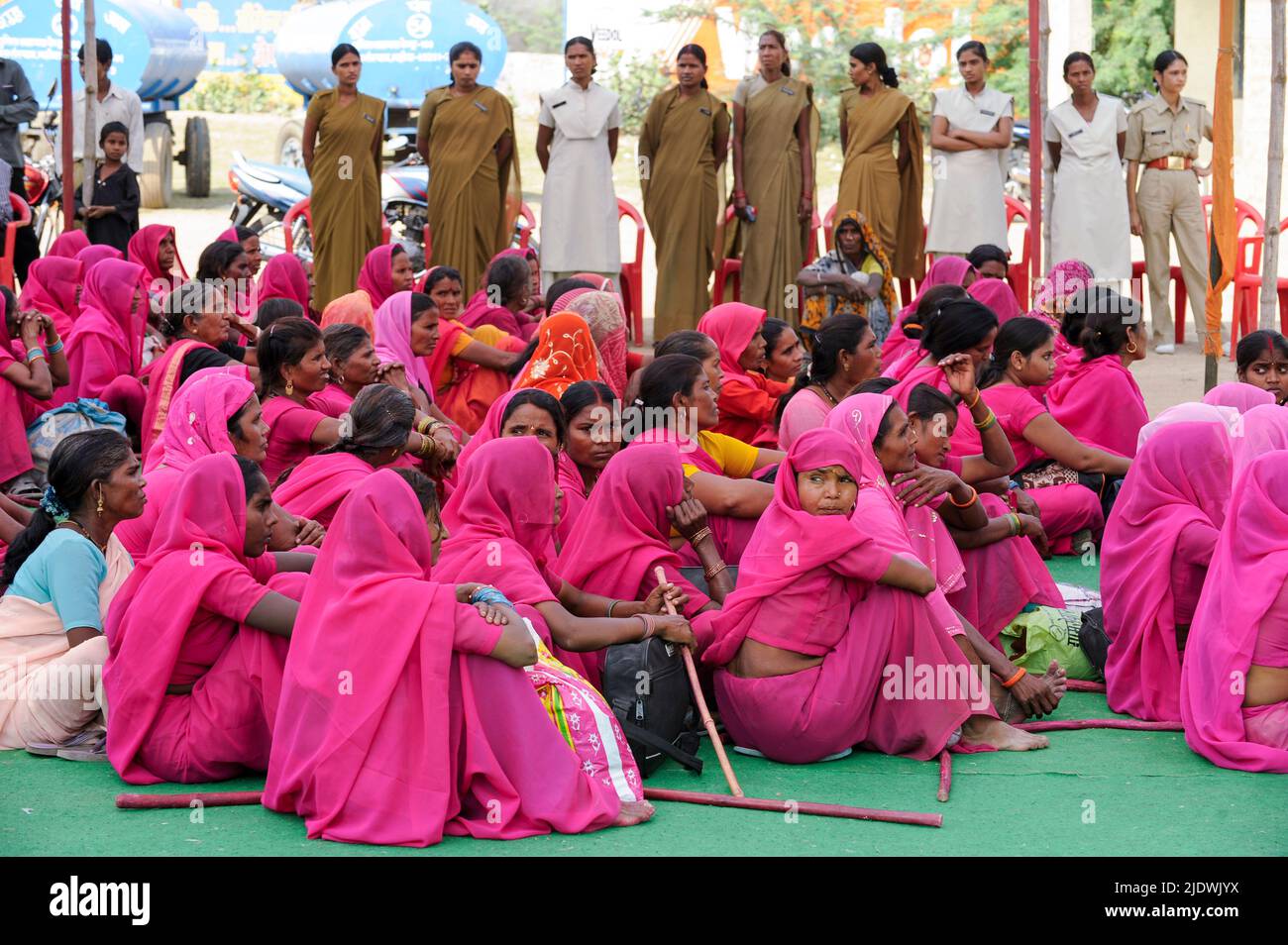 INDIA, Uttar Pradesh, Bundelkhand, women movement Gulabi Gang, founded by  Sampat Pal Devi, carrying lathi a bamboo stick and wearing symbolic pink  sari, they fight for women rights and against violence of