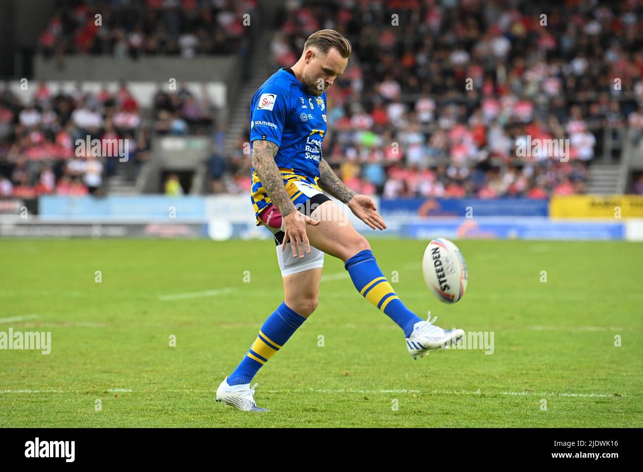 Blake Austin (6) of Leeds Rhinos kicks the ball during pre match warm