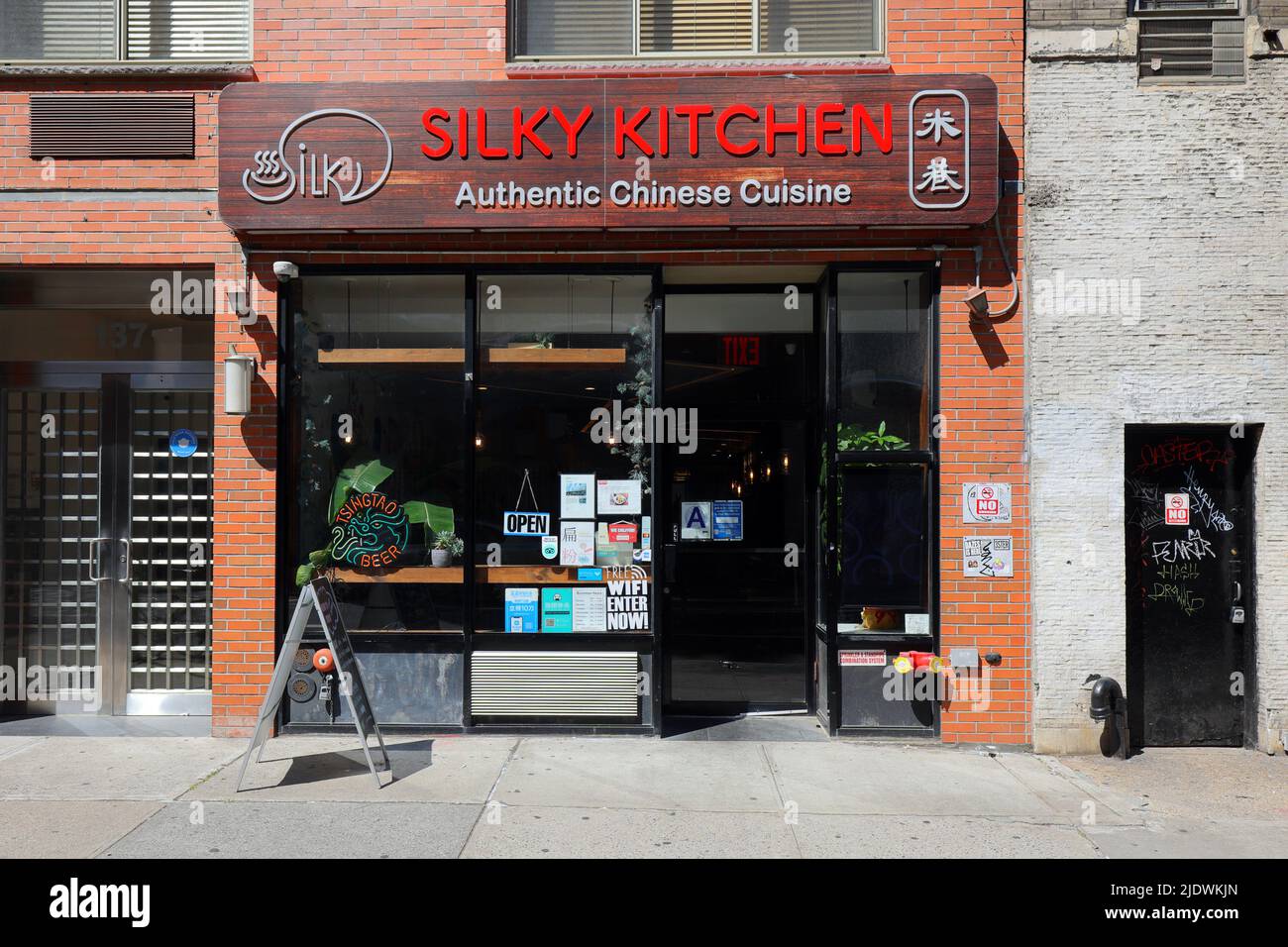 Silky Kitchen, 137 E 13th St, New York, NY. exterior storefront of a Hunan restaurant in the East Village neighborhood in Manhattan. Stock Photo