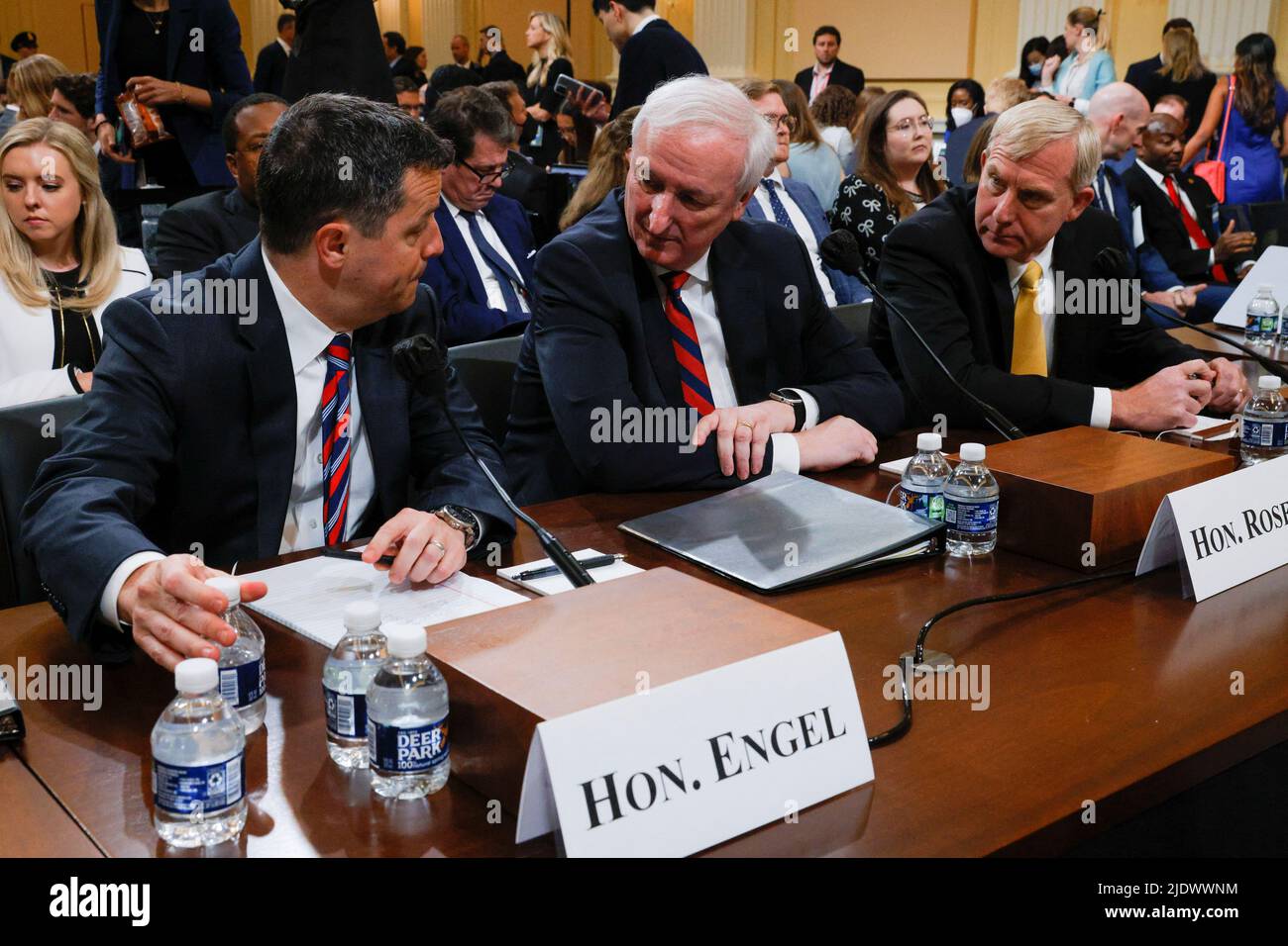 Former Assistant Attorney General for the Office of Legal Counsel Steven Engel, former Acting Attorney General Jeffrey Rosen and former Acting Deputy Attorney General Richard Donoghue talk during a break in the fifth public hearing of the U.S. House Select Committee to Investigate the January 6 Attack on the United States Capitol, on Capitol Hill in Washington, U.S., June 23, 2022. REUTERS/Jim Bourg Stock Photo