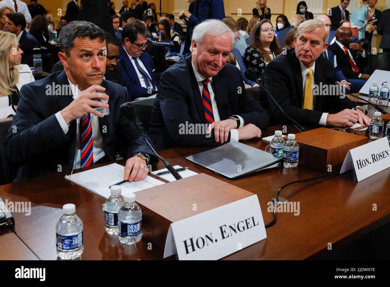 Former Assistant Attorney General for the Office of Legal Counsel Steven Engel, former Acting Attorney General Jeffrey Rosen and former Acting Deputy Attorney General Richard Donoghue are seen during a break in the fifth public hearing of the U.S. House Select Committee to Investigate the January 6 Attack on the United States Capitol, on Capitol Hill in Washington, U.S., June 23, 2022. REUTERS/Jim Bourg Stock Photo