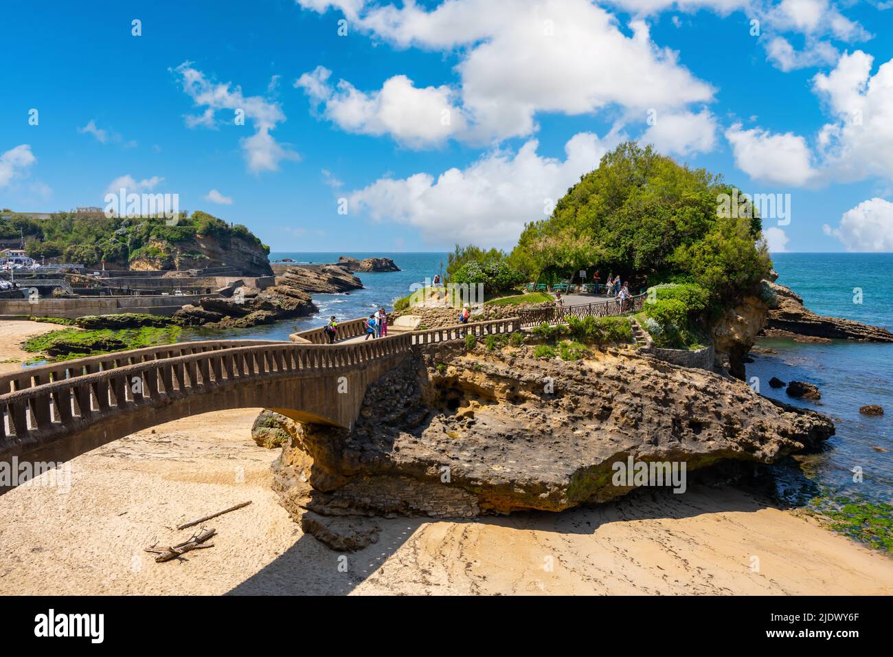 Biarrtiz, France - May 7th 2022 - tourists visiting the rocks of Rocher du Basta in Biarritz Stock Photo