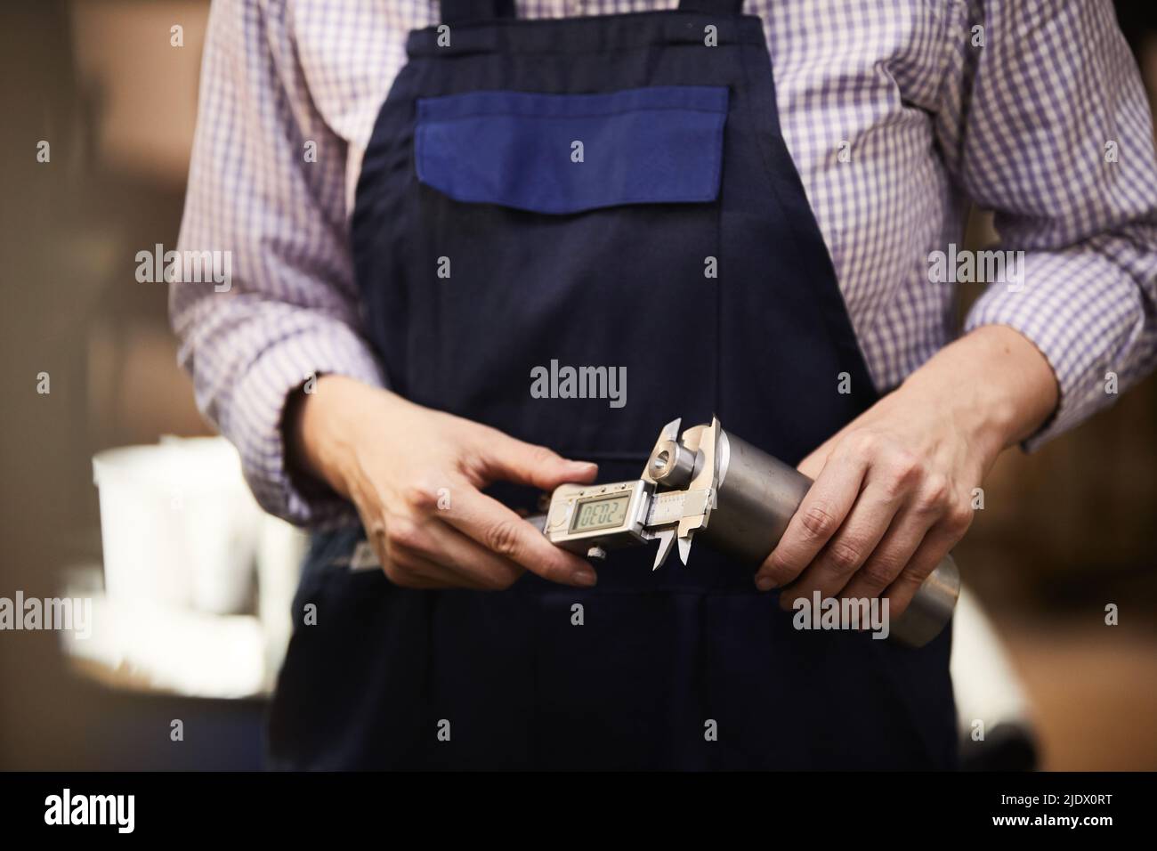 Worker Using Calipers Professional caliper measuring tool hi-res stock photography and images ...